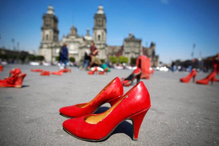 Pairs of women's red shoes, put on display by Mexican visual artist Elina Chauvet to protest against gender violence and femicide, are pictured at Zocalo square in Mexico City